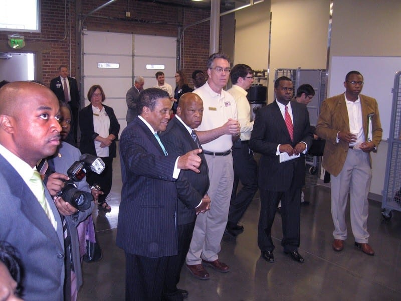 Congressman John Lewis and Mayor Kasim Reed stand with Dennis Creech at the opening of the SWEET Center.