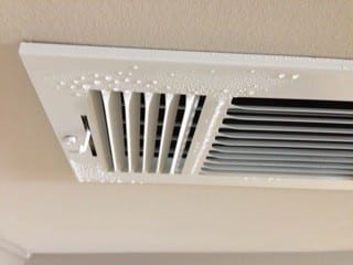 supply vent with condensation.jpeg